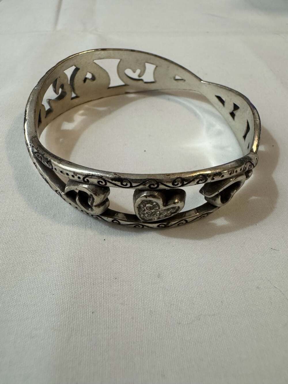 Brighton Silver Tone Heart Cutout Hinged Bangle Bracelet